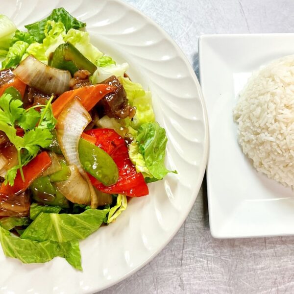 C4. Bò Lúc Lắc (Vietnamese Shaking Beef) – Black Pepper Steak Served With Sautéed Onions, Lettuce, and Rice